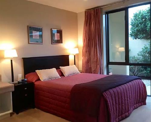 Palazzo Motor Lodge Nelson Bagian luar foto A bedroom